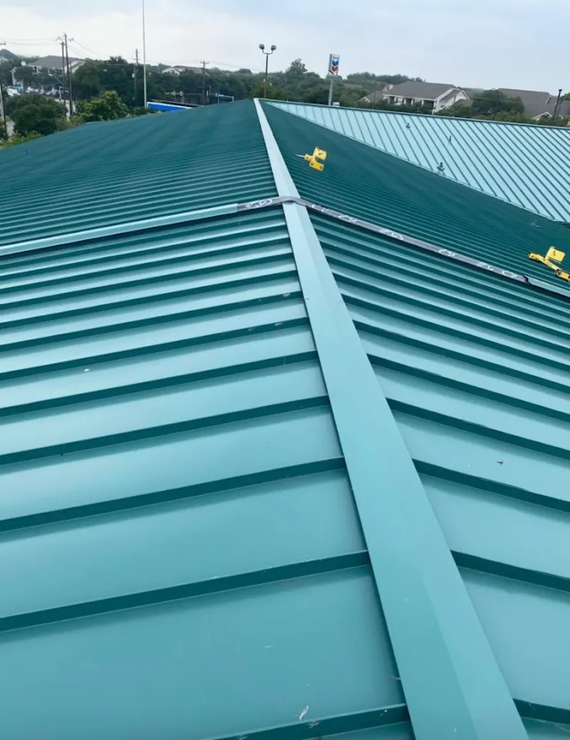Green commercial metal roof ridge and valley for Metal Roof Repair in Port Arthur